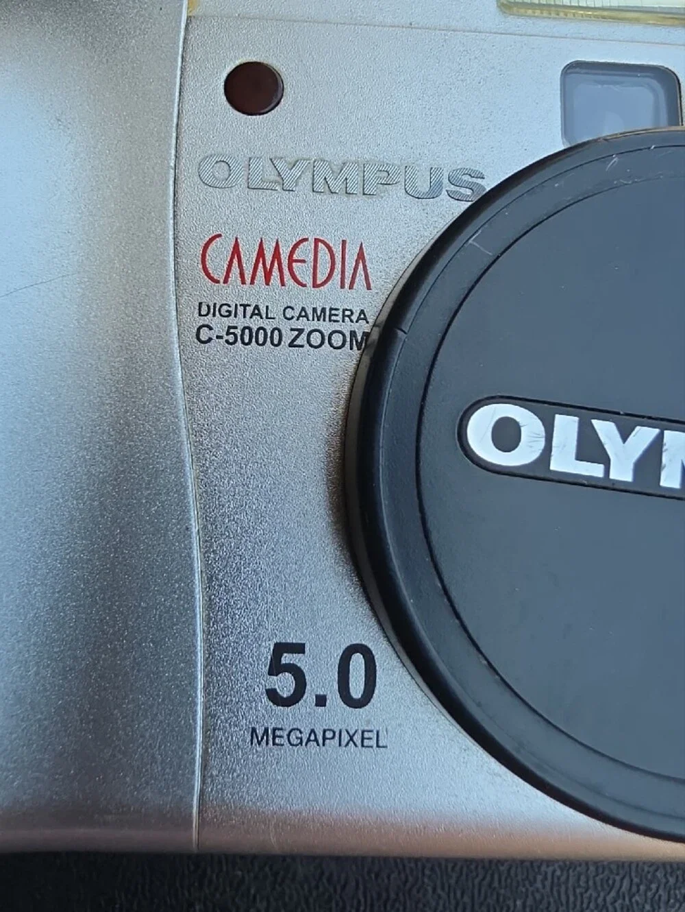 Olympus Silver Point-and-Shoot Digital Camera with Batteries and 256MB Card, 5.0